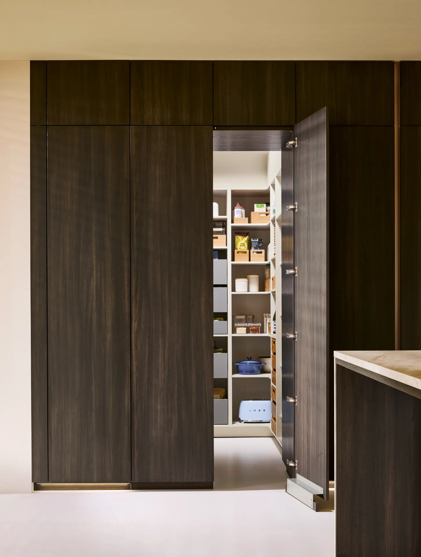Storage with timber doors opening onto shelving